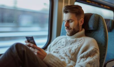 a man learning an Turkish intermediate language course while riding in a train